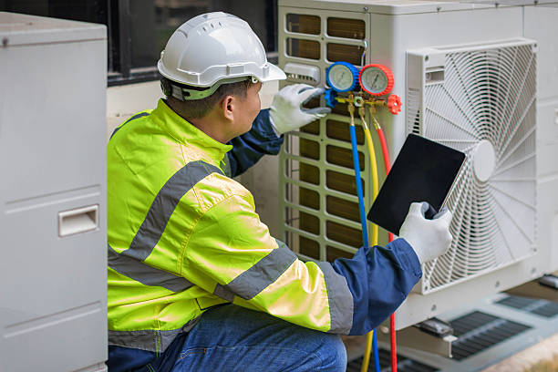 Professional Air Conditioning Repair technician working in Linn Grove, IA